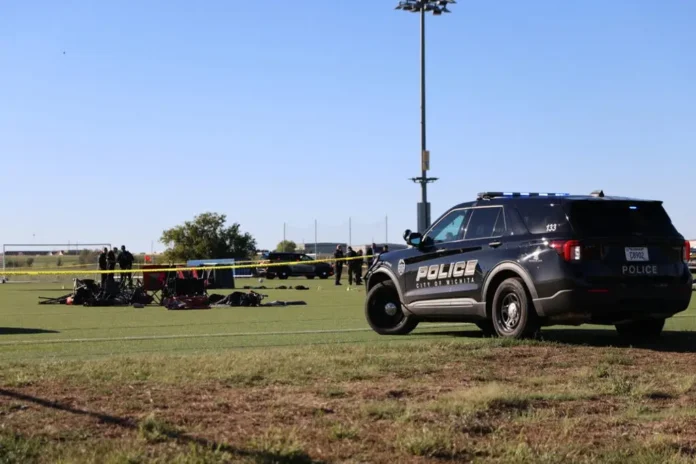 Emergency responders at Stryker Sports Complex in Wichita, Kansas, following a truck crash during a youth soccer game that killed two people on October 17, 2026.